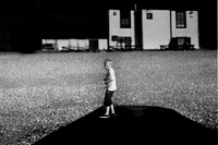 Boy and white house
