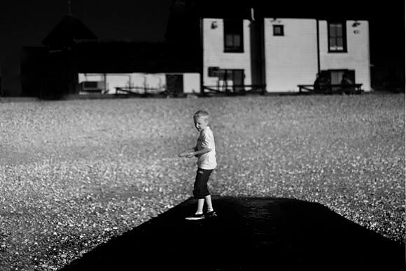 Boy and white house
